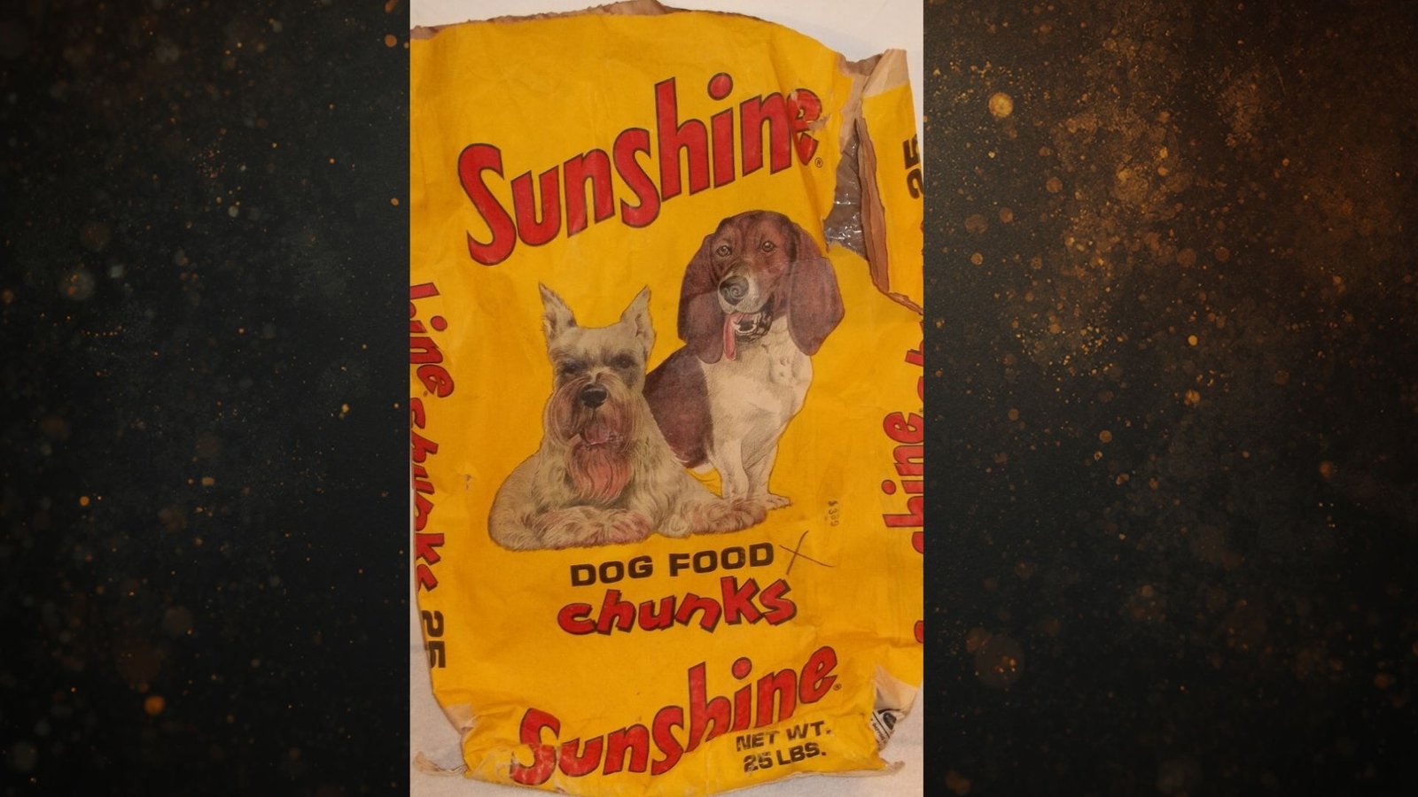 -"Vintage Sunshine Chunks Dog Food 25 lb yellow bag featuring schnauzer and basset hound dogs"